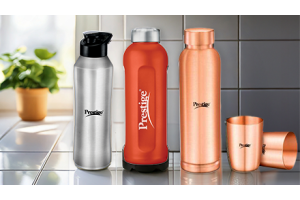 Three TTK Prestige reusable water bottles (black, red, and gold)
