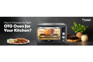 Prestige OTG oven cooking chicken with rotisserie, surrounded by plants and kitchenware